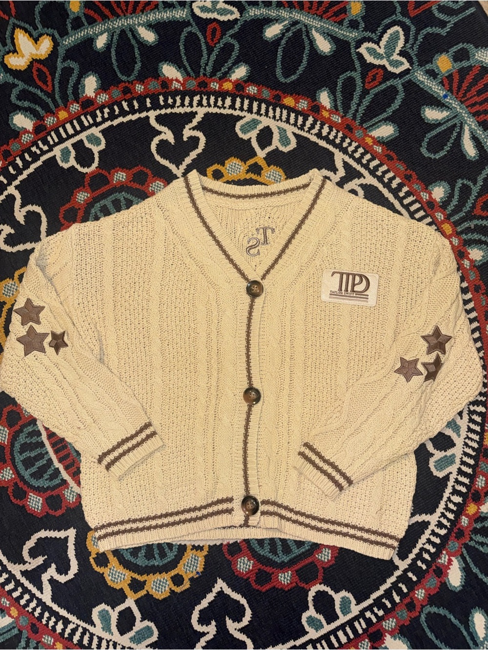 Taylor Swift Cream Cable Knit Cardigan with Brown Trim and Star Patches